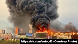 Пожар в автоцентре в Кемерове