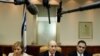 JERUSALEM : Israeli Prime Minister Ehud Olmert (C), Foreign Minister Tzipi Livni (L) and Cabinet Secretary Oved Yehezkel attend the weekly cabinet meeting at Olmert's office in Jerusalem 29 July 2007.