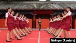 Подготовка к параду в КНР – участницы учатся ходить в ногу 
