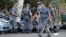 Armenia -- Armenian police officers block the streets to Erebuni police station where gunmen are holding hostages in Yerevan on July 19, 2016. 