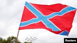 Визнані Україною терористичними угруповання «ДНР» та «ЛНР» у 2014 році затвердили окремий прапор так званої Новоросії