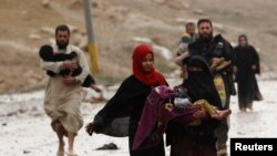 Мосулдан качууга аргасыз болгондор.