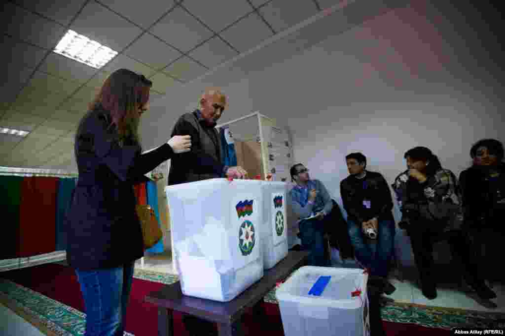 People cast their ballots during the presidential election in Baku.