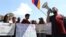 Armenia - Opposition supporters demonstrate outside the venue of the Democracy Forum attended by Armenian officials and Western diplomats, Yerevan, May 20, 2022.