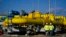 Employees walk at the construction site of a gas metering station, part of the pipeline link between Bulgaria and Greece near the village of the Malko Kadievo, on March 18.