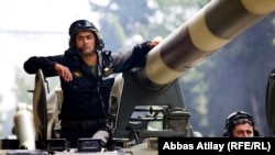 Azerbaijani troops participate in a military parade in Baku on June 26.