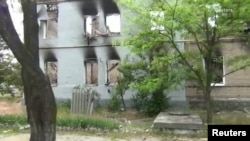 Русия баскынлыгындагы Рубежное шәһәре. Архив фотосы