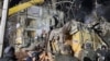 Ukrainian rescuers work at the site of a destroyed apartment building in Kramatorsk after it was hit by a Russian air strike on February 1.