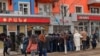 Nagorno-Karabakh - Residents of Stepanakert line up outside a local food store, January 20, 2023.