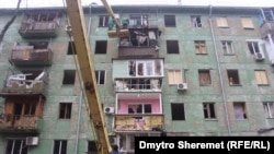 Наслідки влучання ракети С-300 в житловому районі Запоріжжя, січень 2023 року