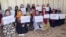 Afghan women protest inside a home in Kabul on August 15.
