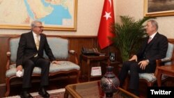 Turkey - Turkish Defense Minister Hulusi Akar (right) meets Ambassador Serdar Kılıç to discuss normalization talks with Armenia, January 10, 2022.
