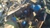Rescuers work in the ruins of a residential building destroyed by a military strike in the town of Toretsk in Ukraine's Donetsk region. 