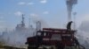 Ukrainian firefighters work at the site of a Russian missile attack on the port of Odesa on July 23. 