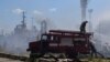 Firefighters work at a site of a Russian missile strike at the sea port of Odesa on July 23.
