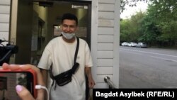 Kazakhstan - Administrator of the satirical public Qaznews24 Temirlan Ensebek at the exit from the police building. Almaty, 15May2021.
