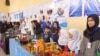 دختران دانش‌آموز در هرات ربات های دست ساز خود را به نمایش گذاشتند