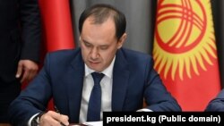 Эркинбек Осоев.