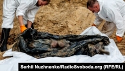 Эксгумацыя пахаваных каля Ізюму
