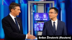 Кандидаты в президенты Словении Борут Пахор (слева) и Марьян Шарец во время теледебатов 