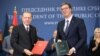 Turkish President Recep Tayyip Erdogan (left) and Serbian President Aleksandar Vucic pose during a signing ceremony in Belgrade on October 10.