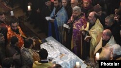 Armenia - A requiem service for 6-month-old Seryozha Avetisian at Gyumri's Surp Nshan Church, 20Jan2015.