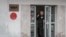 A security guard at the entrance to Novaya gazeta's building in Moscow on March 15