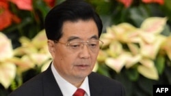 Ху Цзинтао курултайда сөз сүйлөөдө.
