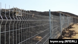 Випалена земля у заповіднику обмежується парканом