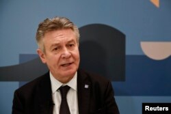 Карел Де Гюхт