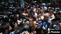 Armenia - General Hunan Poghosian, the first deputy chief of the Armenian police, speaks to reporters near a police building in Yerevan seized by anti-government gunmen, 18Jul2016.