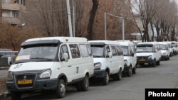 Armenia - Commuter minibuses are parked on a street during a public transport strike in Yerevan, 16 January 2018.