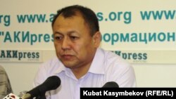 Осунбек Жамансариев.