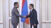 Armenian parliament speaker Ara Babloyan (right) and Syrian Ambassador Muhammad Haj Ibrahim meet in Yerevan on September 3.
