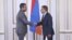 Armenian parliament speaker Ara Babloyan (right) and Syrian Ambassador Muhammad Haj Ibrahim meet in Yerevan on September 3.
