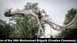 Під покровом антидронових сіток: як захищають дороги у прифронті від російських FPV (фоторепортаж)