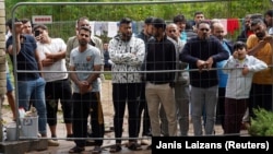 Միգրանտներ Լիտվայում՝ Բելառուսի հետ սահմանին, օգոստոս, 2021թ․ 