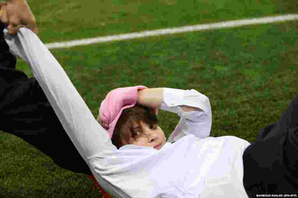 The group said the pitch invasion had been a protest with demands including: To free political prisoners, stop&nbsp;putting people in jail for social media &quot;likes,&quot; and allow&nbsp;political competition in Russia. 