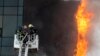Russian firefighters tackle a blaze at a business center in Moscow on June 3. 