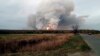 Smoke and fire are seen at the stricken ammunition depot in Russia's western Ryazan region.