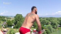 High Divers Take 22-Meter Plunge From Kosovo Bridge