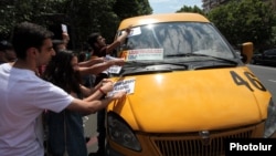 Armenia -- Youth activists campaign against a rise in public transport fares Yerevan, 20Jul2013.