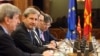 EU Commissioner Johanes Hahn (second from left) kicks off a series of talks with political leaders in Macedonia on March 21. 