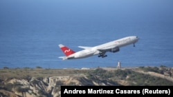Վենեսուելա - Ռուսական Nordwind ավիաընկերության «Բոինգ 777» օդանավը թռիչք է կատարում Կարակասի օդանավակայանից, 30-ը հունվարի, 2019թ․