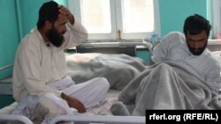 آرشیف - دو تن از افراد مبتلا به بیماری روانی برای درمان در شفاخانه بستری شده اند