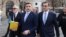 George Simion (center) prepares to file his application for candidacy in Romania's May presidential election in Bucharest on March 14.
