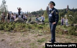 A Russian National Guard stands watch in Zaryadye Park in central Moscow on September 12.