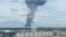A still image, taken from video footage, shows smoke rising from the site of blasts at an explosives plant in the town of Dzerzhinsk.