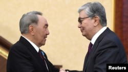 Казакстандын туңгуч президенти Нурсултан Назарбаев менен азыркы мамлекет башчы Касым-Жомарт Токаев.