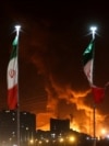 FILE PHOTO: Fire rages at Tehran's Shahran oil depot in Iran after Israeli attack